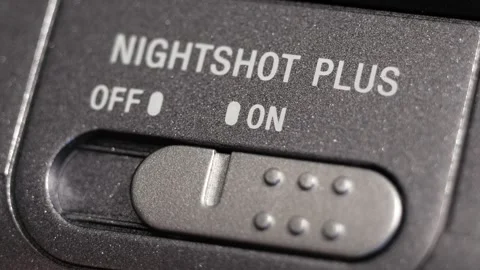 NightShot Plus Switch Slides From Off To On Close Up Stock Footage 332892643
