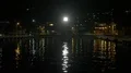 Nightshot water light reflections in a domestic indonesian harbor HD Footage