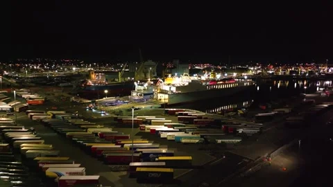 Nighttime Activity at Bustling Cargo Yard in Dublin Port Stock Footage 332444723