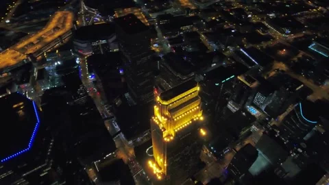 Nighttime aerial flight over downtown Minneapolis Minnesota with skyscrapers Stock Footage 344520194