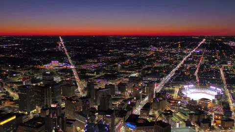 Nighttime aerial flight over downtown Detroit, Michigan, city lights Stock Footage 344787366
