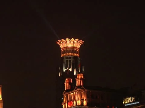 Nighttime on the bund - close up of Lotus Roof Stock Footage 10890953