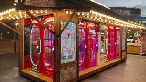 Nighttime Carnival Claw Machine Arcade With Neon Lights Stock Footage 329173844