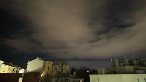 Nighttime Cityscape with Clouds Stock Footage 303912252