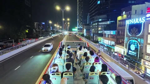 Nighttime cityscape on double decker bus Stock Footage 294746385