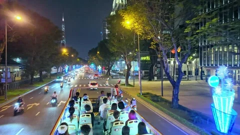 Nighttime cityscape on double decker bus Stock Footage 294747693