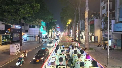 Nighttime cityscape on double decker bus Stock Footage 294747824