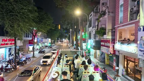 Nighttime cityscape on double decker bus Stock Footage 294750286