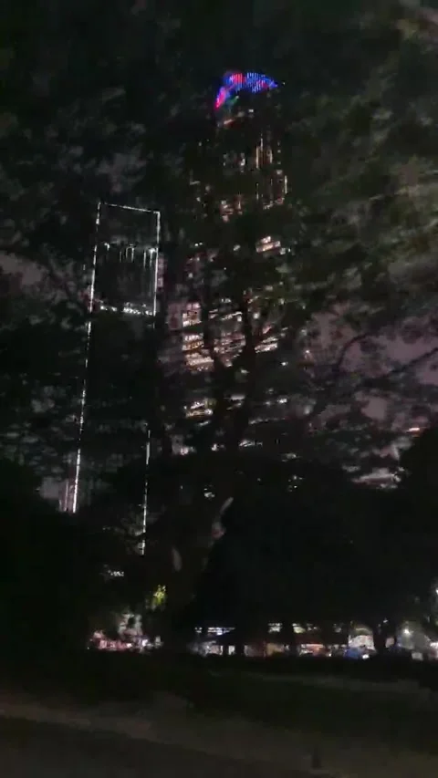 Nighttime Cityscape with Glowing Lights Stock Footage 277140678