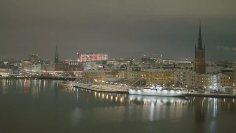 Nighttime Cityscape with Reflections on Water Stock Footage 326225308