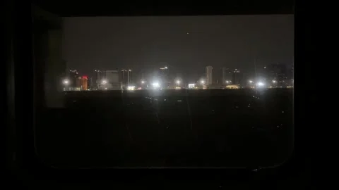 Nighttime Cityscape View from Train in Thailand Stock Footage 342472570