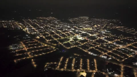 Nighttime drone footage of a small town. Pinhalzinho. Stock Footage 332260124