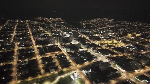Nighttime drone footage of a small town. Pinhalzinho. Stock Footage 332260238