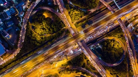 Nighttime Drone Hyperlapse of Metropolitan Traffic and Light Trails Stock Footage 334856207