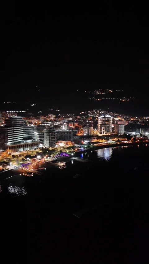 Nighttime Drone View of Budva Old Town and Port with Sparkling Lights Stock Footage 300760559