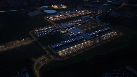 Nighttime drone view of cloud and AI data infrastructure. Stock Footage 318620499