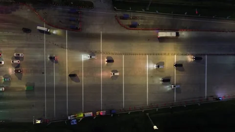 Nighttime drone view of toll road showing car movement Stock-Footage 306199301