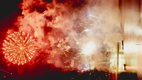 Nighttime fireworks display by the beach Video stock 283121265