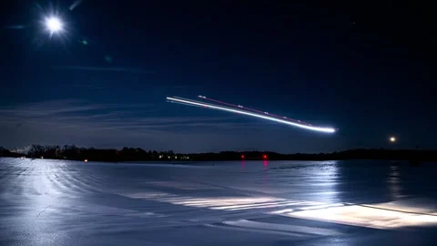 Nighttime Flights Approaching BWI Over The Ice And Snow Timelapse Stock Footage 328121231
