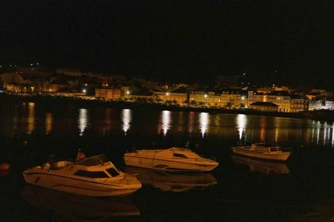 Nighttime Harbor with Reflected Lights Stock Photos
