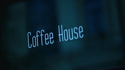 Nighttime Java Fix: Coffee House Sign Illuminated for Late-Night Visitors Stock Footage 275155572
