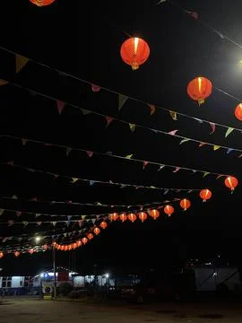 Nighttime Lanterns and Flags for CNY at Titi New Village Stock Photos