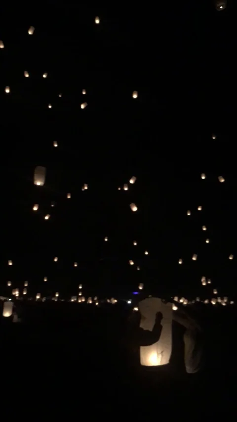 Nighttime lanterns in the sky Stock Footage 124391065