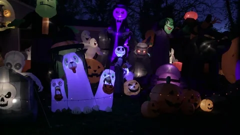 Nighttime lighted Halloween display. Video stock 203854528