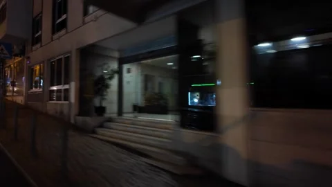 Nighttime Lisbon streets captured through the historic tram 28. Stock Footage 294103823