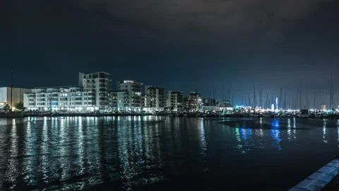 Nighttime Marina with Reflections Stock Footage 303660102