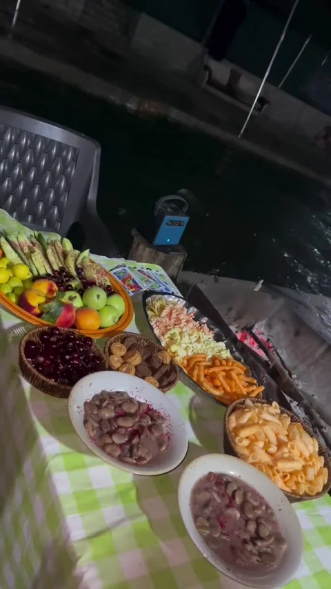 Nighttime Outdoor Picnic Spread By River 库存影片 340871897