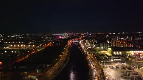 Nighttime River View with City Lights and Industrial Activity in Dublin Stock Footage 332444667
