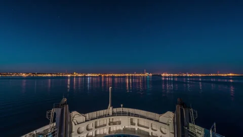 Nighttime Ship Deck View with City Lights Stock Footage 303644756