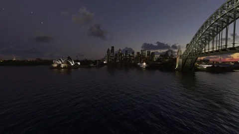 Nighttime side aerial drone view of the Opera House in Sydney. Australia Stock Footage 269878477