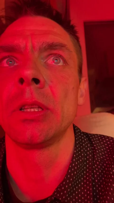 Nighttime studio captures intense emotional shifts and dramatic lighting Stock Footage 335354883