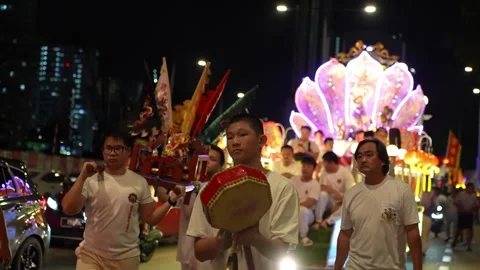 Nighttime Taoist Procession with Drummers, Flags, and Illuminated Deity Floats Video stock 346245120