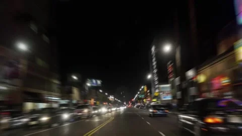 Nighttime time lapse street scene with bokeh lights in Hollywood, Los Angel.. Stock Footage 280265132