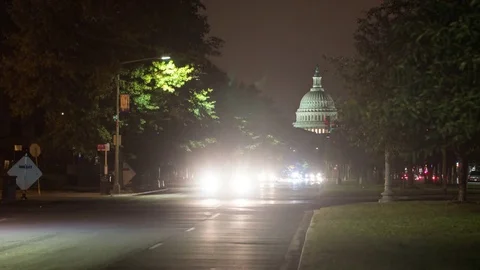 Nighttime time-lapse of traffic in washington dc with capital in background Stock Footage 82831581