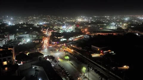 Nighttime Traffic Intersection in Downtown San Jose del Cabo With Hazy City Stock Footage 340381933