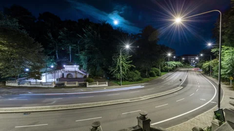 Nighttime Traffic Light Trails on Curving Street in Helsingborg Sweden Stock Footage 342485062