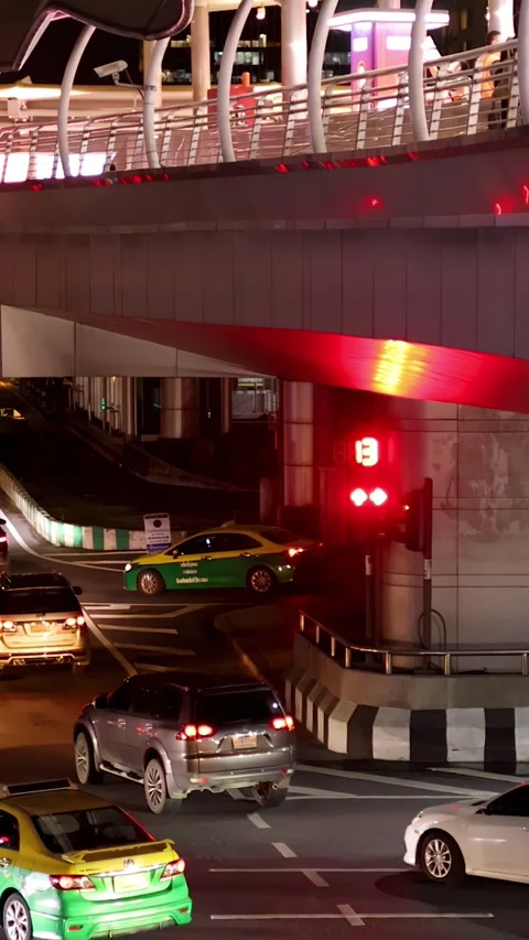 Nighttime Traffic Waiting at Red Light on Sathorn Road Stock Footage 317064156