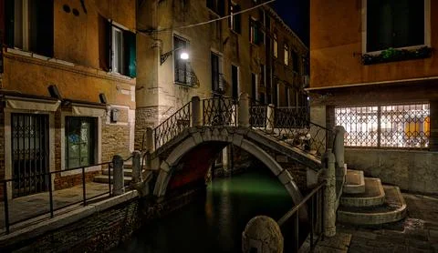 Nighttime tranquility over a charming bridge in Venice Stock Photos