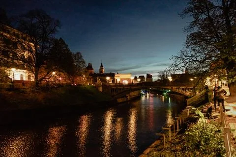 Nighttime View of a Bridge Over the River Ljubljanica in Ljubljana, Slovenia Stock Photos