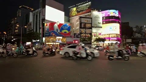 Nighttime view of a busy roundabout in Ho Chi Minh City, Vietnam. Stock Footage 336467127