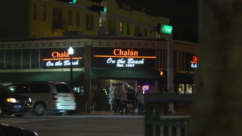 Nighttime View of Chalan on the Beach Restaurant Exterior Stock Footage 342563718