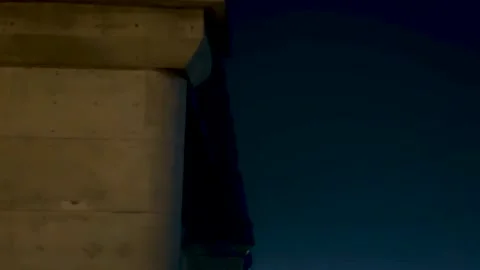 Nighttime view of a concrete bridge with intricate metalwork against a deep.. Stock Footage 340221540