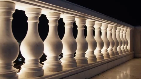 Nighttime view of illuminated balustrade on balcony Stock Footage 338245481