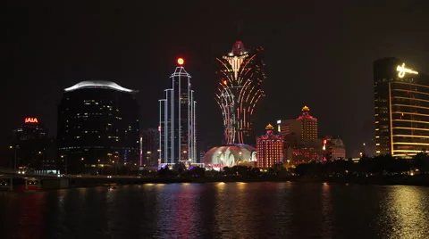 Nighttime view of the Macau skyline with its famous casinos Stock Footage 58489372