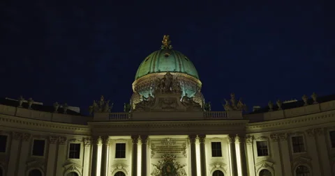 Nighttime view of St. Michael's Wing at the Hofburg in Vienna, Austria Stock Footage 252045819