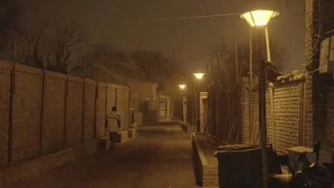 Nighttime Walk Through Dimly Lit Alleyway in Beijing Residential Neighborhood Stock Footage 345773645